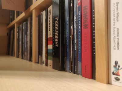 An assortment of CDs on a shelf